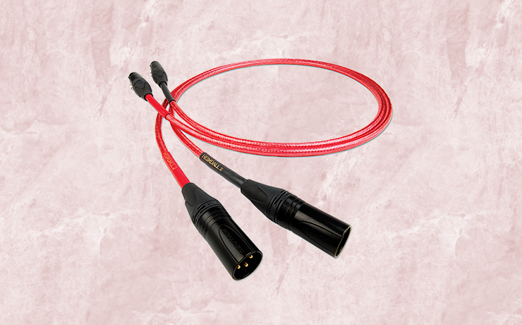 Nordost Heimdall 2 Analogue Interconnect.  Background is a salmon marble pattern.