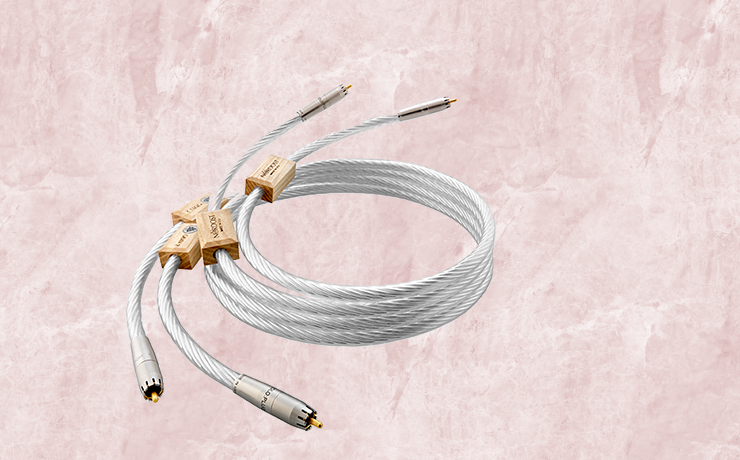 Nordost Odin 2 Analogue Interconnect.  Background is a salmon marble pattern.