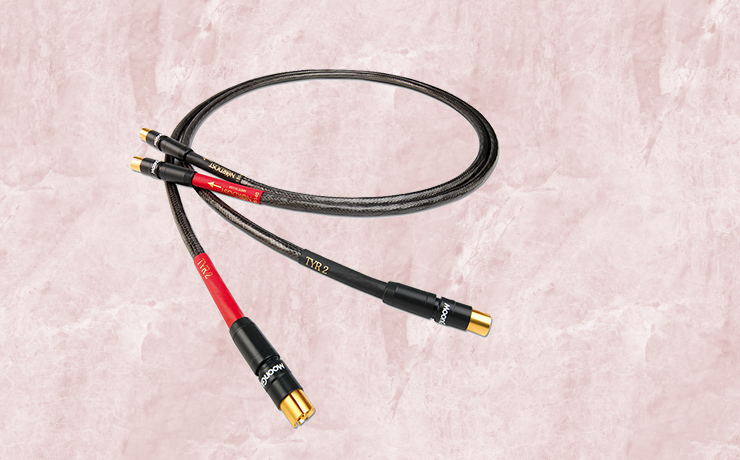 Nordost Tyr 2 Analogue Interconnect.  Background is a salmon marble pattern.
