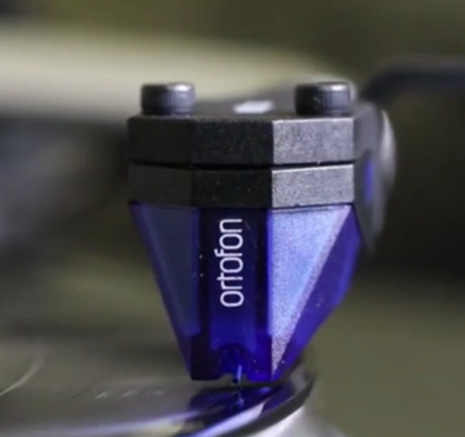 Ortofon 2M Blue cartridge playing a record