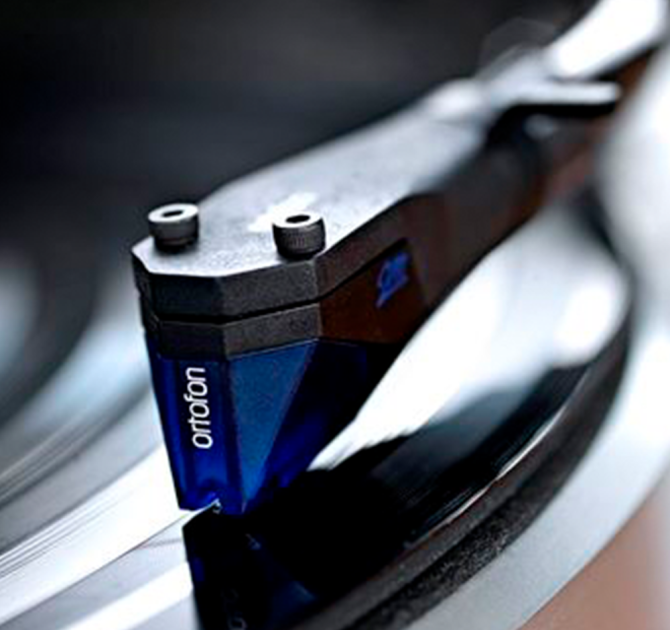 Ortofon 2M Blue cartridge playing a record