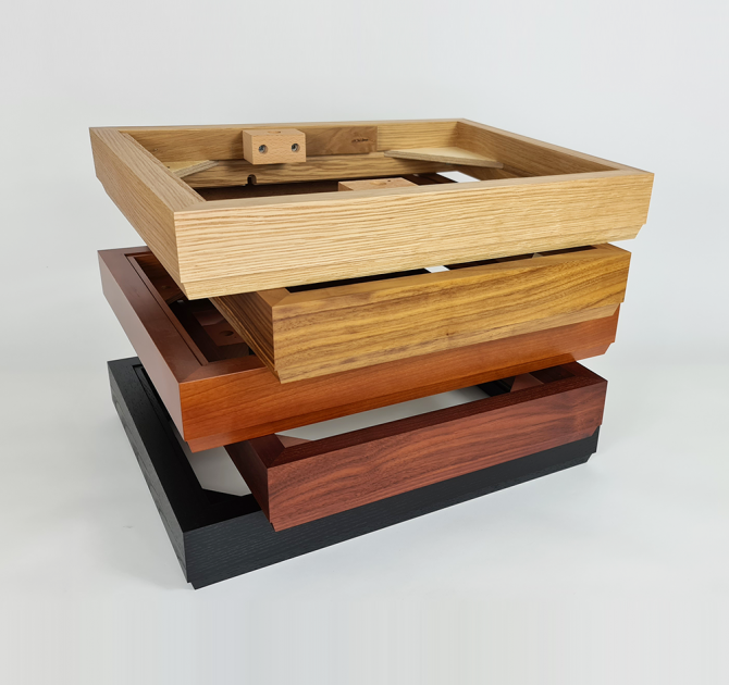 LP12 plinths stacked.  In order from the top: oak; walnut; cherry; rosenut; and black ash