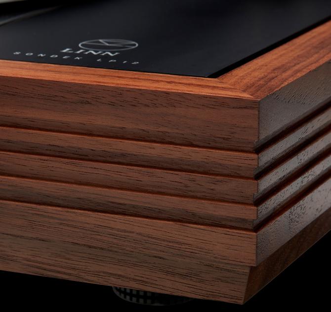 The corner of a Linn LP12 Fluted Plinth turntable