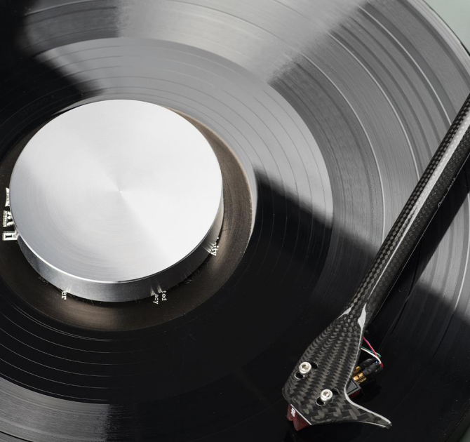 Project Record Puck E on a record in silver