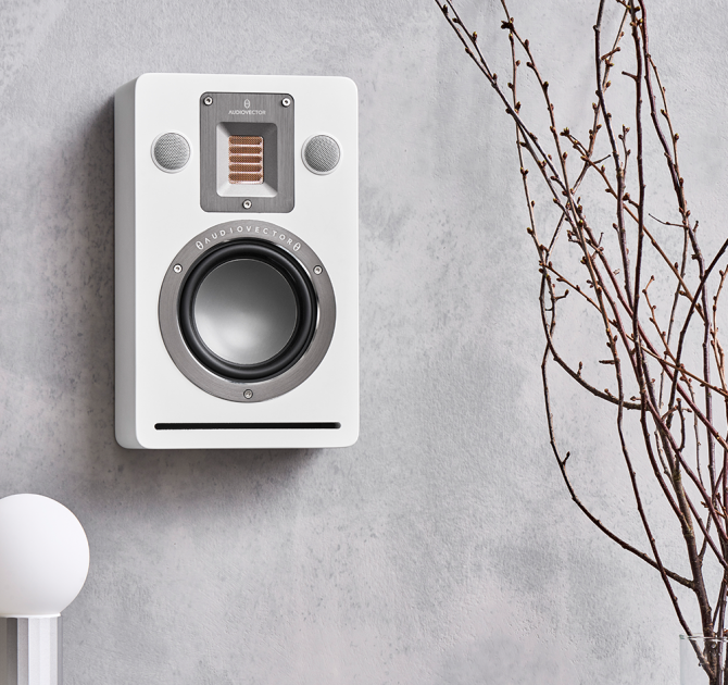 Audiovector QR Wall in white silk, on a wall.