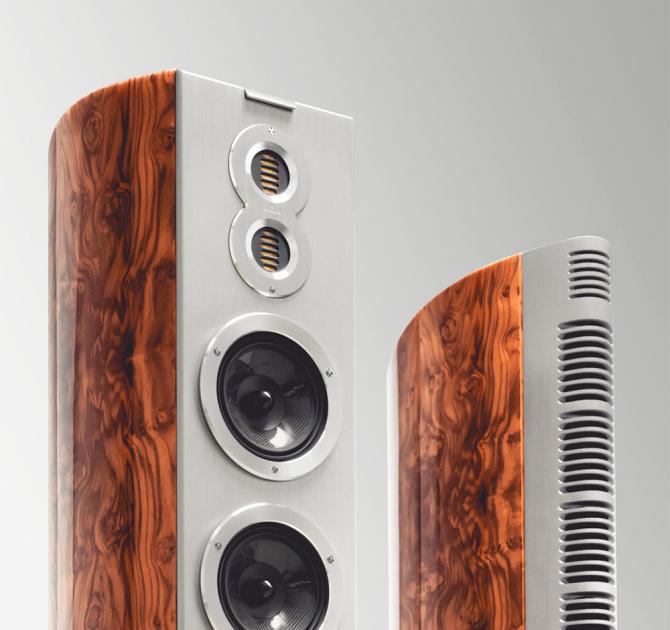 A pair of Audiovector R10 Arreté Loudspeaker - one viewed from the front and one from the rear.  Only the top section of the speakers is visible