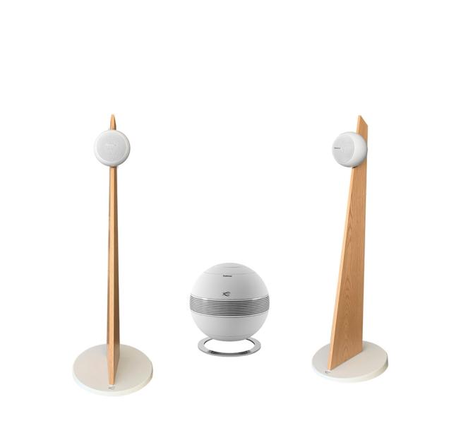 Cabasse iO3 speakers in white with oak stands with a white pearl sub