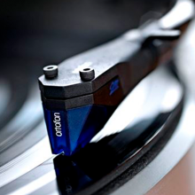 Ortofon 2M Blue cartridge playing a record