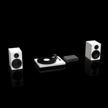 Two speakers and a turntable in white with a Project Maia S3