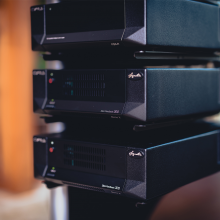 Cyrus Mono X 300 mono power amplifier with two other pieces of Cyrus equipment.
