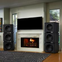 REL HT/1510 Predator Subwoofer - two stacks of three either side of a tv