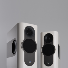 A pair of Kii Three Loudspeakers in matt white