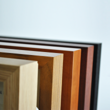all five plinth options standing up on their end, one in front of the other.  Order from front to back is oak, walnut, cherry, rosenut and black ash