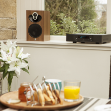 Linn Majik 109 Loud Speaker on a window sill.