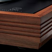 The corner of a Linn LP12 Fluted Plinth turntable