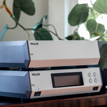 Melco N10/2 Digital Music Library in silver on a table.  One on top of the other.  There's a trailing plant behind.