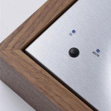 Project The Classic Evo with Quintet Red Cartridge - Turntable corner close-up of walnut with speed buttons "33" and "45/78".