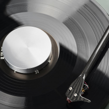 Project Record Puck E on a record in silver