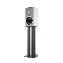 A bookshelf sized speaker on a grey stand