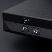 Cyrus TTP Turntable close-up of the power and speed buttons