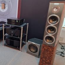 Audiovector R Sub beside an Audiovector R8 Arrete speaker